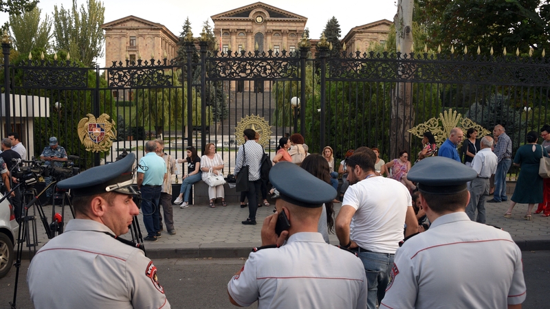 Armenian opposition supporters and relatives of wounded soldiers gather at parliament to call for Prime Minister Nikol Pashinyan's resignation
