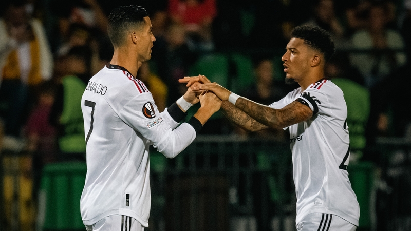 Cristiano Ronaldo and Jadon Sancho celebrate the opening goal