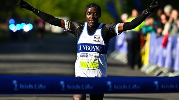 Peter Somba of Dunboyne AC crosses the line