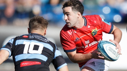 Munster scrum-half Paddy Patterson is closed down by Jarrod Evans