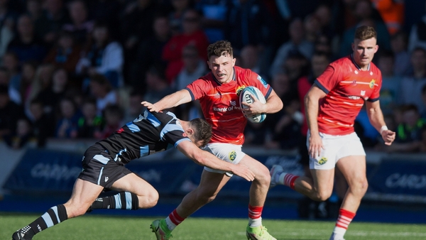 Munster's Calvin Nash is tackled by Tomos Williams of Cardiff