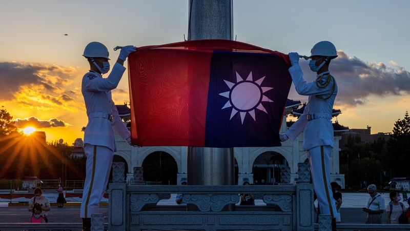 A flag-lowering ceremony takes place at Liberty Square in Taipei