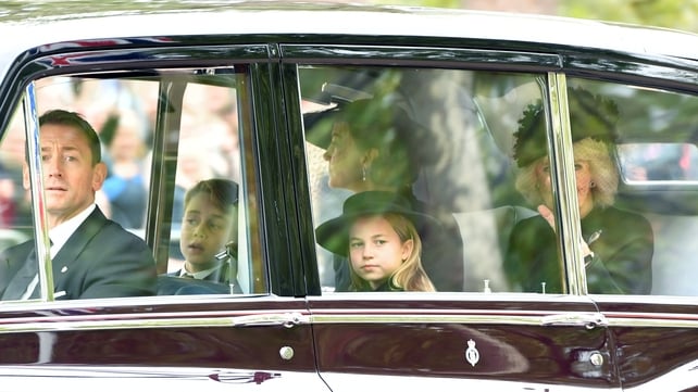 Catherine, the Princess of Wales, and Queen Consort Camilla travel in the funeral procession with Prince George and Princess Charlotte (Anthony Devlin/Getty)