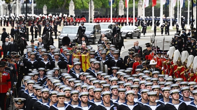 This morning, the queen's flag-draped casket was pulled on a gun carriage the short distance from Westminster Hall to the Abbey by 142 sailors with arms linked (Oli Scarff/AFP)