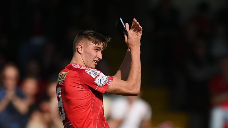 Sean Boyd applauds the Shelbourne fans as he leaves the pitch against Bohemians