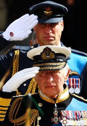 Line of succession: Charles, the UK's new king, with his son and next-in-line William behind (Hannah McKay/WPA pool/Getty)
