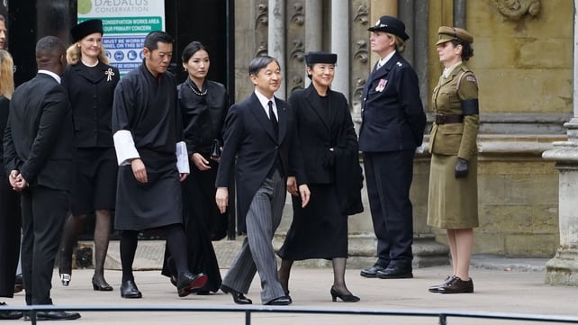 Emperor of Japan Naruhito and wife Empress Masako, and King Jigme Khesar Namgyel Wangchuck with Queen Jetsun Pema of Bhutan arrive at Westminster Abbey (James Manning/AFP)