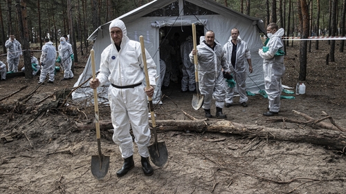 Ukrainian authorities exhume bodies of people killed as a result of war in Izium city after Russian Forces withdrew