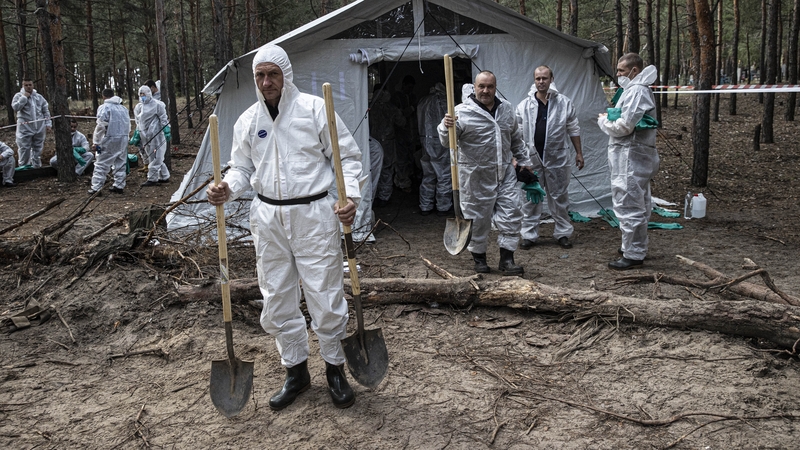 Ukrainian authorities exhume bodies of people killed as a result of war in Izium city after Russian Forces withdrew