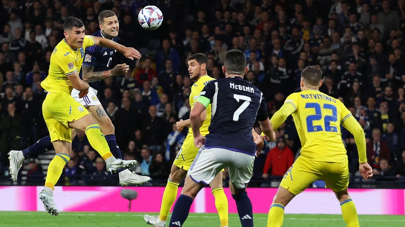 Lyndon Dykes heads home Scotland's second goal