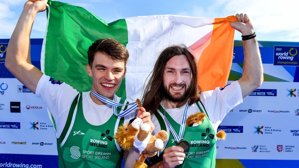 Fintan McCarthy, left, and Paul O'Donovan of Ireland celebrate with their gold medals