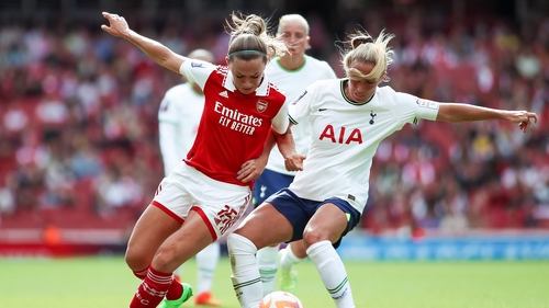 Katie McCabe battles for the ball against Spurs captain Shelina Zadorsky