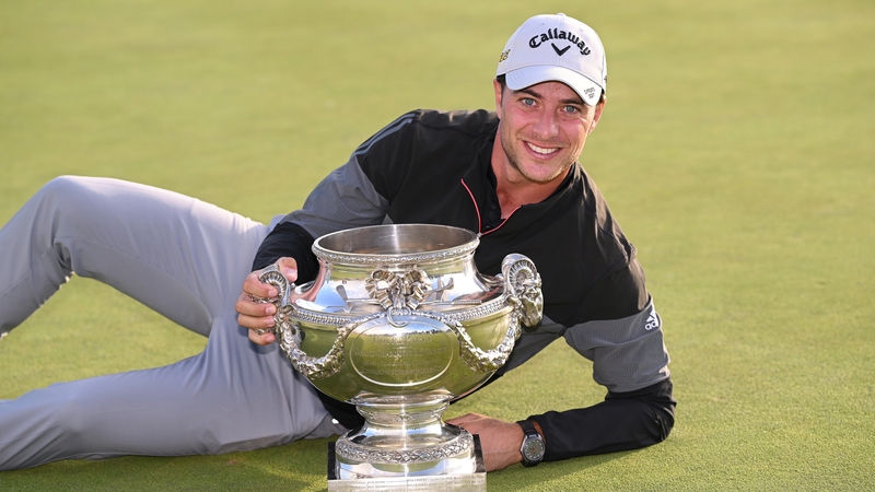 Guido Migliozzi poses with the trophy