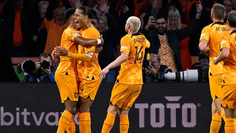 Netherlands captain Virgil Van Dijk celebrates scoring the opener against Belgium on Sunday night