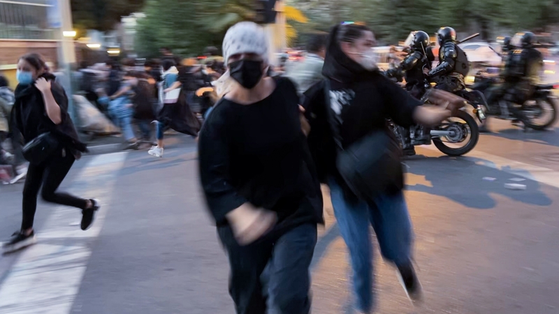 Protestors and police clash during a rally for Mahsa Amini in Tehran last week. Photo: Anadolu Agency via Getty Images