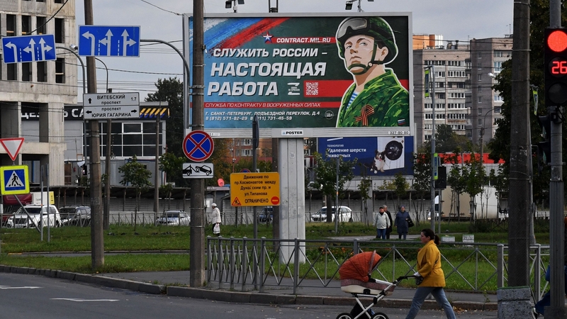 A billboard in St Petersburg, Russia asking for people to sign up to join the army