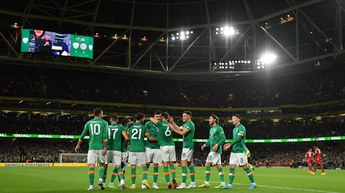 John Egan celebrates his opening goal at Lansdowne Road