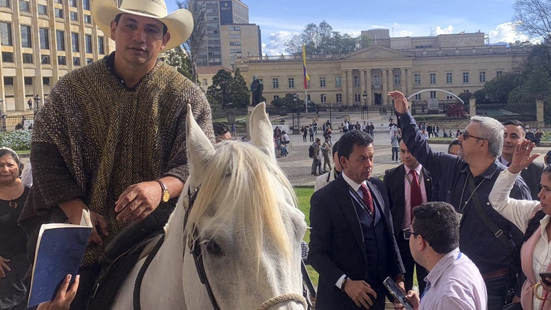 Colombian senator Alirio Barrera brought his pet horse to work