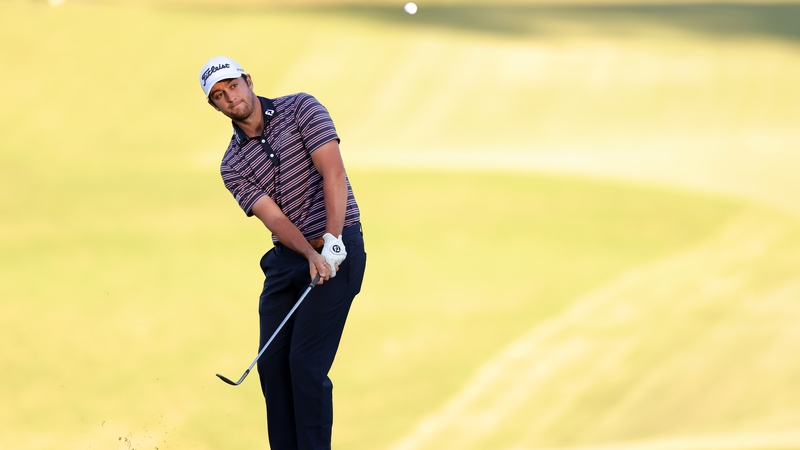 Davis Riley chips on the 18th