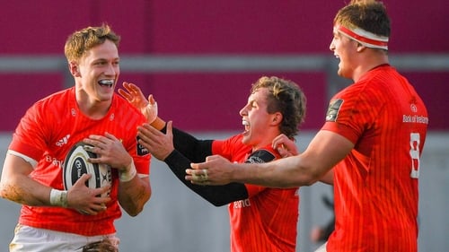Mike Haley (left) celebrates with team-mate Craig Casey (centre) and Gavin Coombes