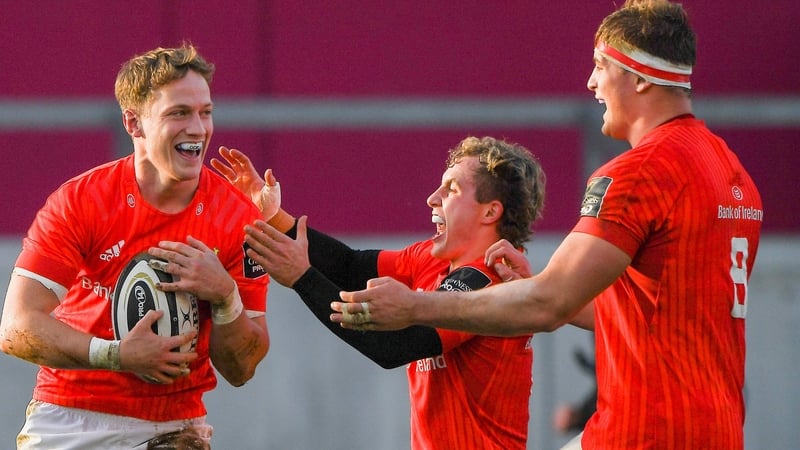 Mike Haley (left) celebrates with team-mate Craig Casey (centre) and Gavin Coombes