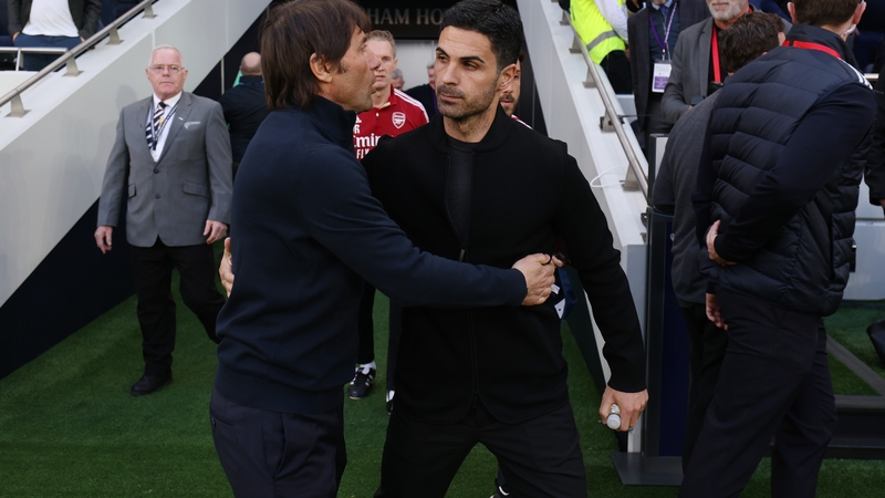 Antonio Conte (L) and Mikel Arteta after last May's derby