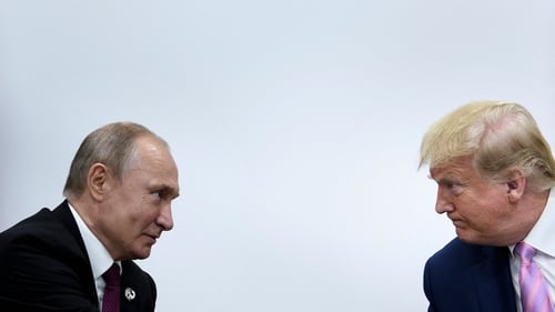 US president Donald Trump Russia's president Vladimir Putin meet during the G20 summit in Osaka in June 2019. Photo: Brendan Smialowski / AFP via Getty Images