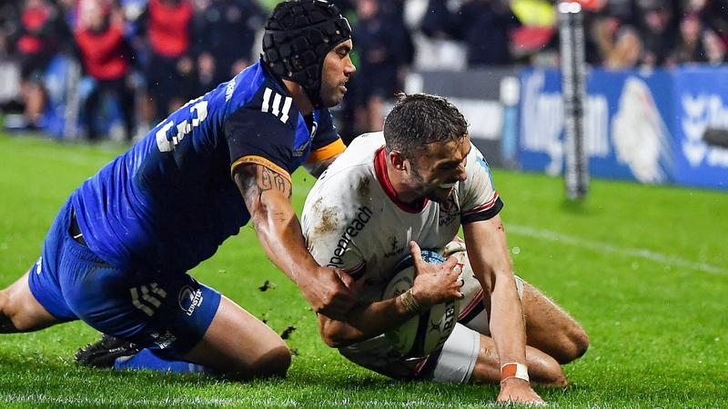 Charlie Ngatai knocks the ball out of Aaron Sexton's grasp to prevent a try