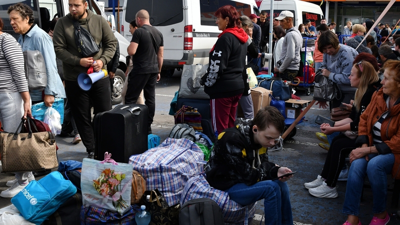 Refugees from south Ukraine are seen during the evacuation of civilians at a refugee centre in Zaporizhzhia