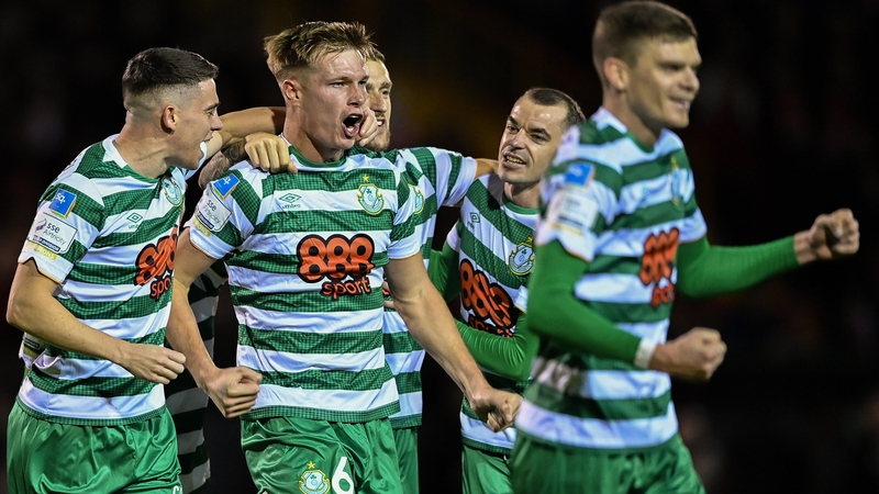 Daniel Cleary (No6) celebrates his opener for Rovers