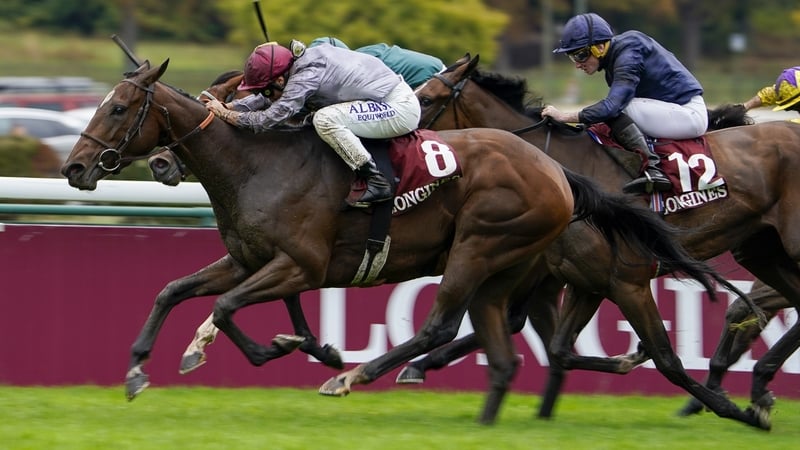Mickael Barzalona riding Place Du Carrousel gets the better of the obscured Nashwa and Hollie Doyle in the green silks in the Prix de l'Opera