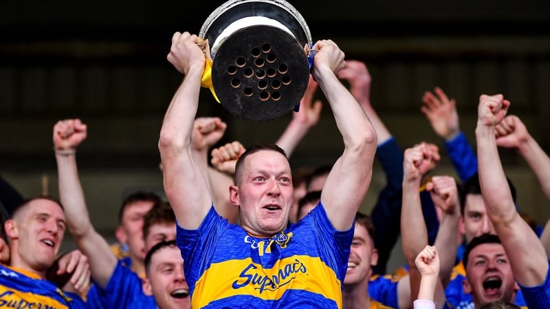 Clough/Ballacolla captain Stephen Maher lifts the cup