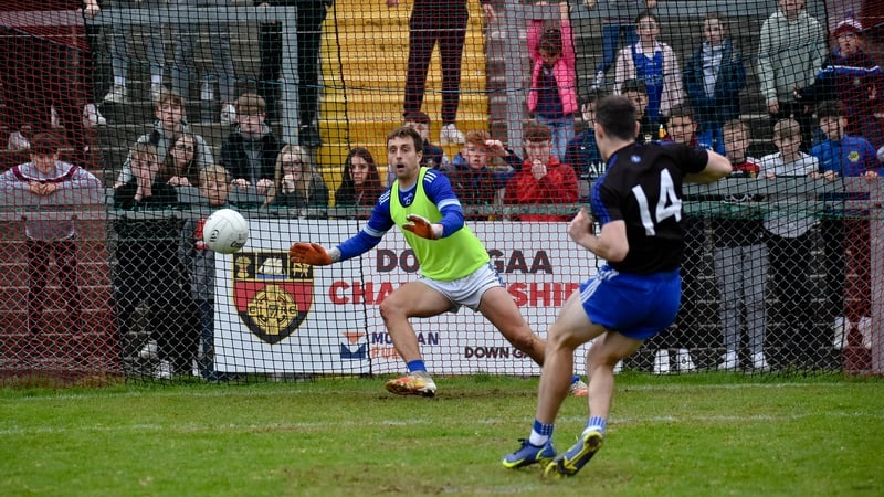 John Boyle faces a penalty from Loughinisland's Rory Mason in the Down semi-final. Photo: Brendan Monaghan