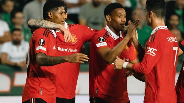 Marcus Rashford (L) and Cristiano Ronaldo (R) celebrate with Anthony Martial after his goal