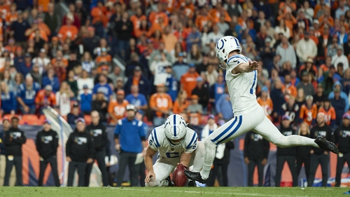 Chase McLaughlin kicks one of his four field goals against the Denver Broncos