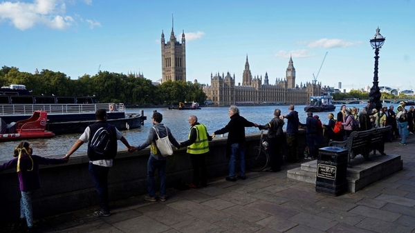 Supporters in London held life-size cut-outs of Julian Assange along with posters in support of him