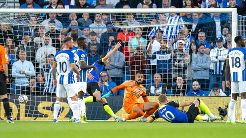 Tottenham Hotspur's Harry Kane (right) scores the game's only goal