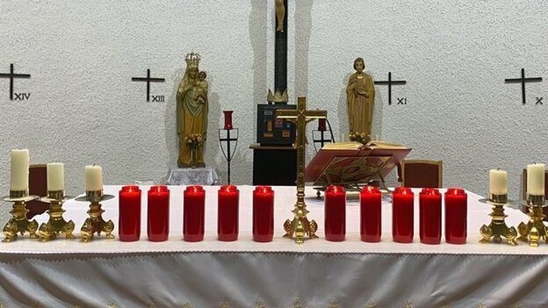 A red candle was then lit by the Bishop of Raphoe for each of the 10 victims of the tragedy, which included two teenagers and a young child