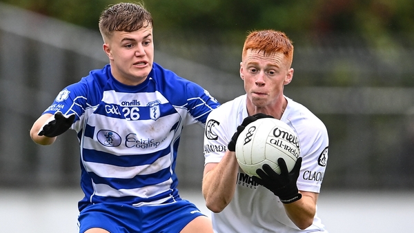 Harry O'Neill secures possession ahead of Tom Browne