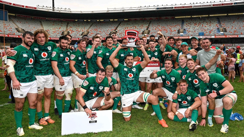 Emerging Ireland captain Max Deegan lifts silverware alongside his team-mates in Bloemfontein