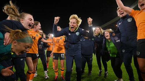 Ireland manager Vera Pauw and her players celebrate beating Scotland to reac the World Cup