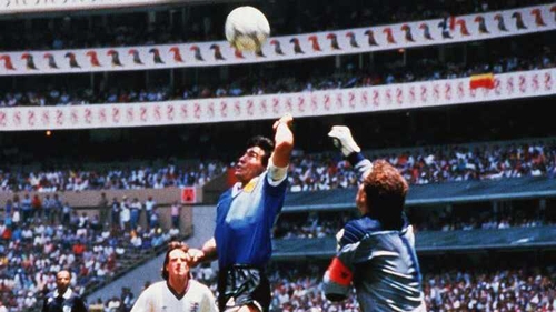 Diego Maradona illicitly beats Peter Shilton to the punch in the Estadio Azteca