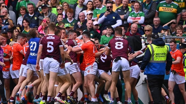 26 June: Players and officials from Galway and Armagh squared up as they made their way to the dressing rooms when their All-Ireland SFC quarter-final ended level after 70 minutes