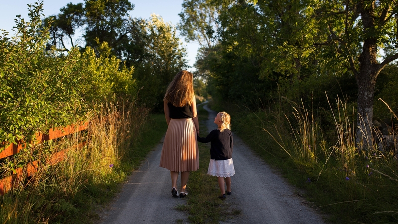 'We could start by asking why parenthood should come at a high financial cost and why that cost is borne only by women.' Photo: Jon Flobrant/Unsplash
