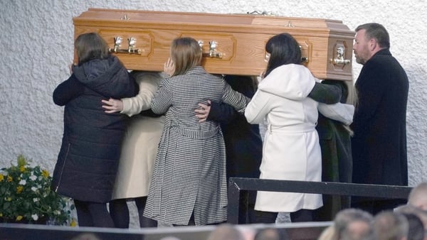 The remains of Hugh Kelly are taken into St Michael's Church, Creeslough