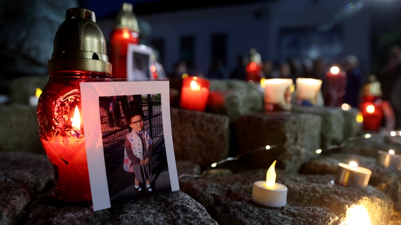 Candles and a picture of five-year-old Shauna Flanagan Garwe at a vigil at Market Square, Letterkenny