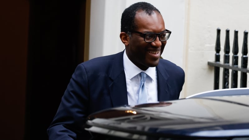 Kwasi Kwarteng leaving Downing Street this afternoon