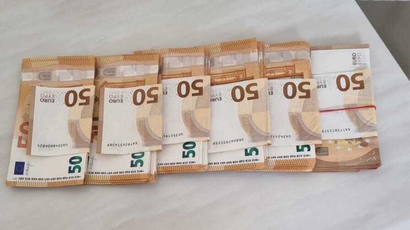 Several thousand euro in cash was seized during the searches