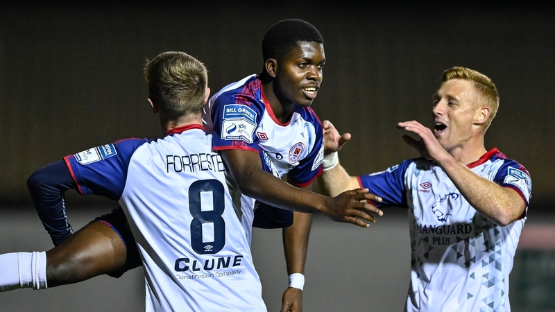 Serge Atakayi celebrates after scoring the third goal for St Pat's against Bohemians