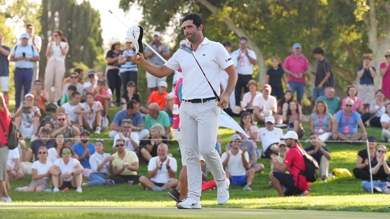 Adrian Otaegui acknowledges the crowd on the 18th green